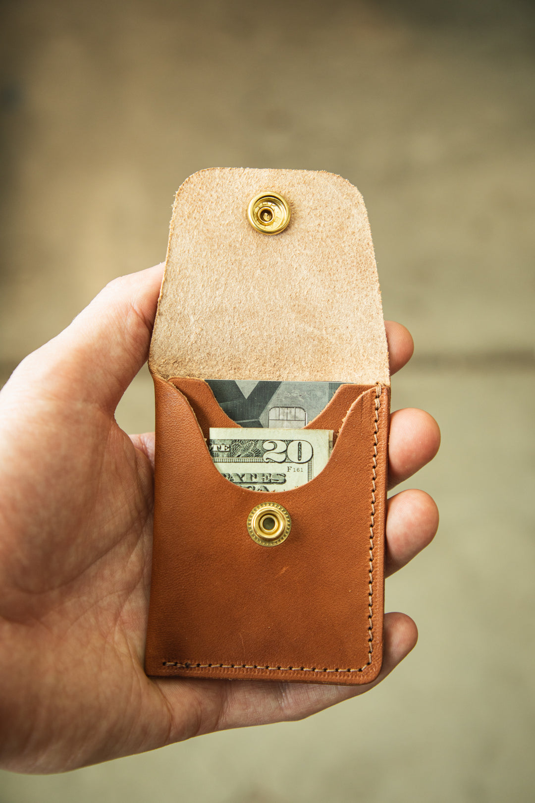 Minimalist wallet creative front snap flap open #color_bourbon