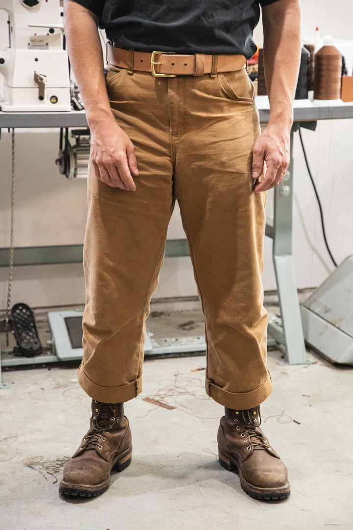 Russet horsehide belt lifestyle tan pants showing boots