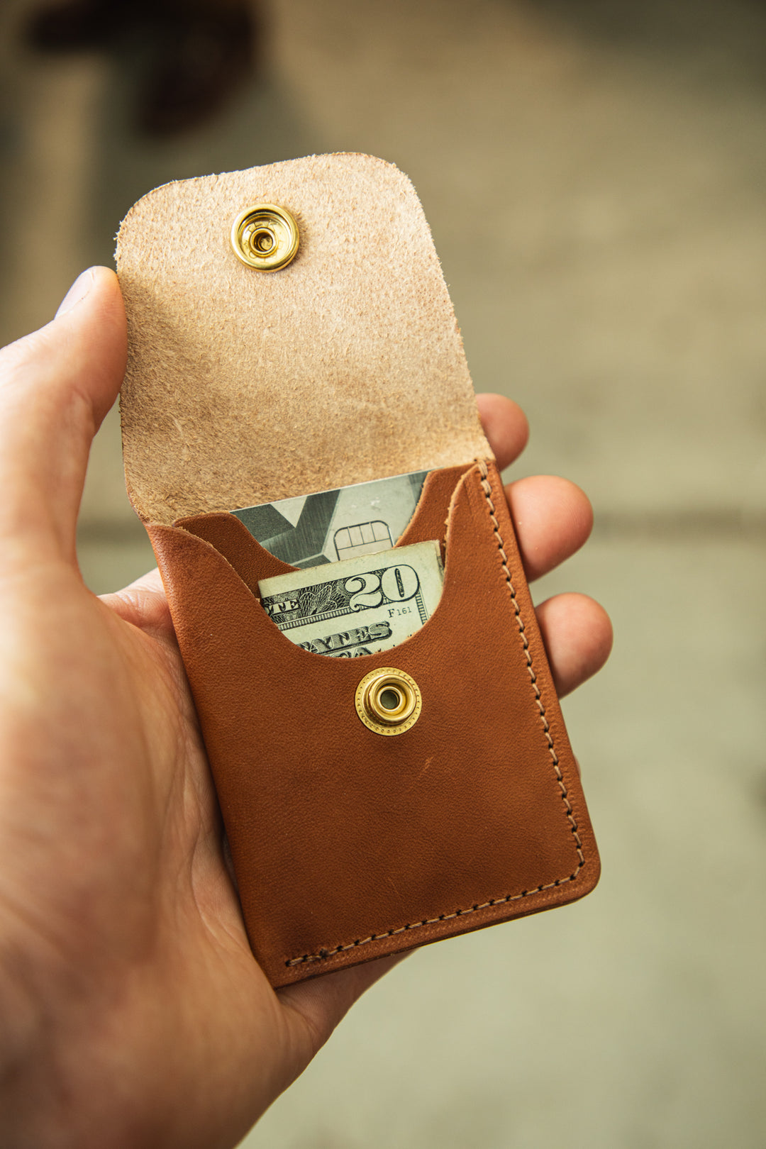 Minimalist wallet creative front snap flap open #color_bourbon