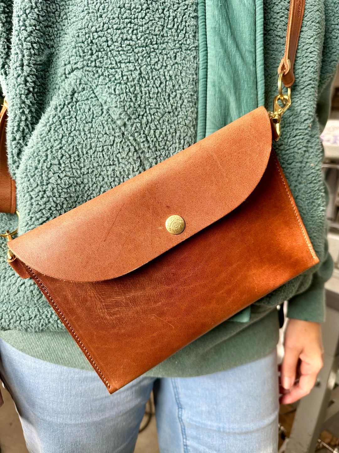 Hip bag over the shoulder strap