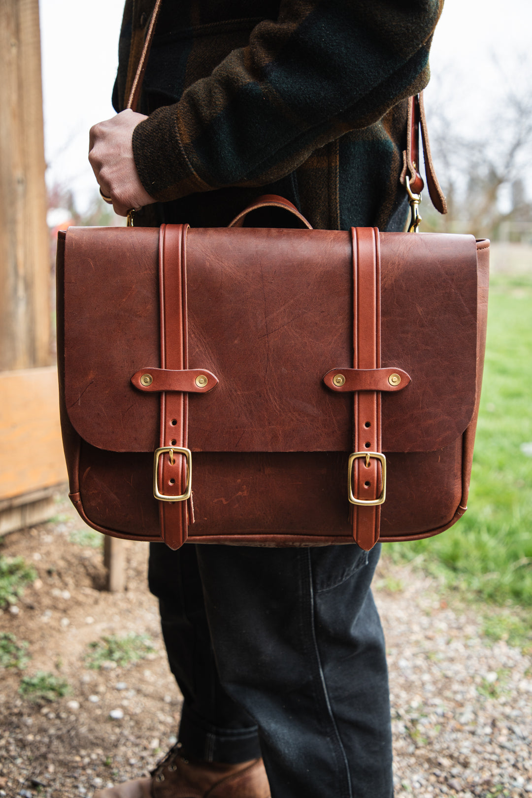 Mens Bags Field Bag Brown Lifestyle Bag On Left Shoulder Zoomed In #color_brown