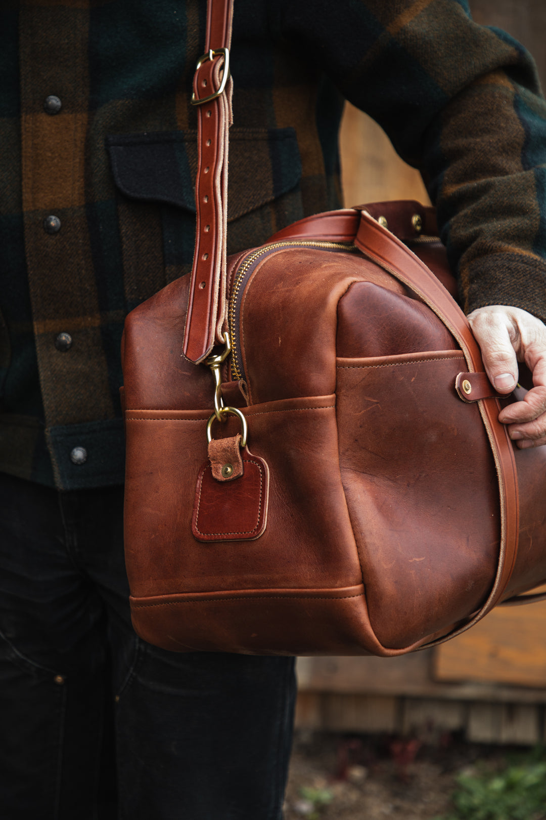 Mens Bag Brown Duffle Bag Front Angle On Person #color_brown