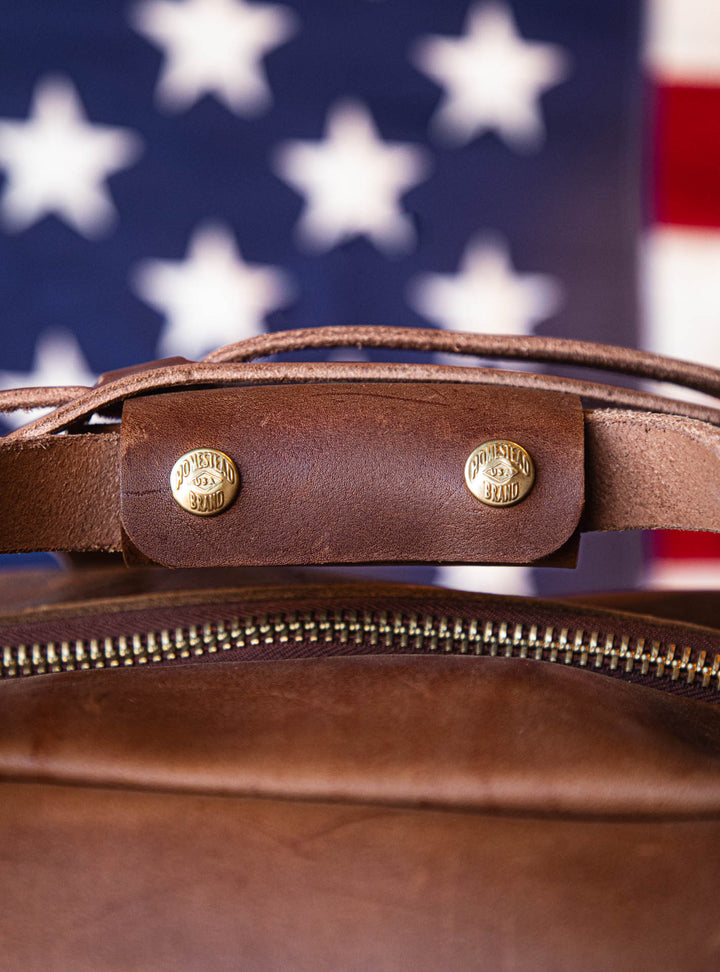 handle keeper on brown leather duffle 