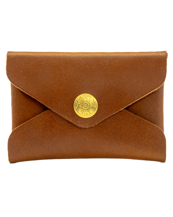 Brown leather wallet with a gold button on a white background #color_brown