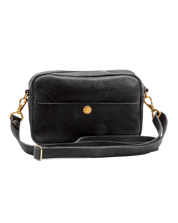 Black leather crossbody bag with gold accents on a white background side two #color_black