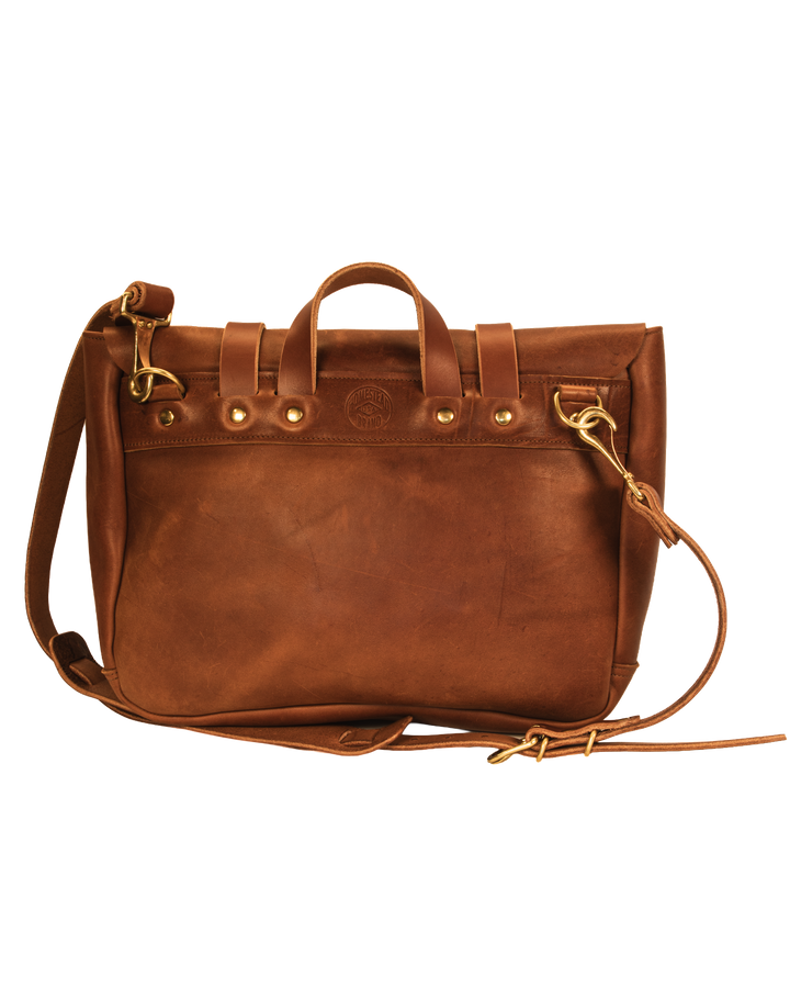 Backside of brown messenger bag on white background 